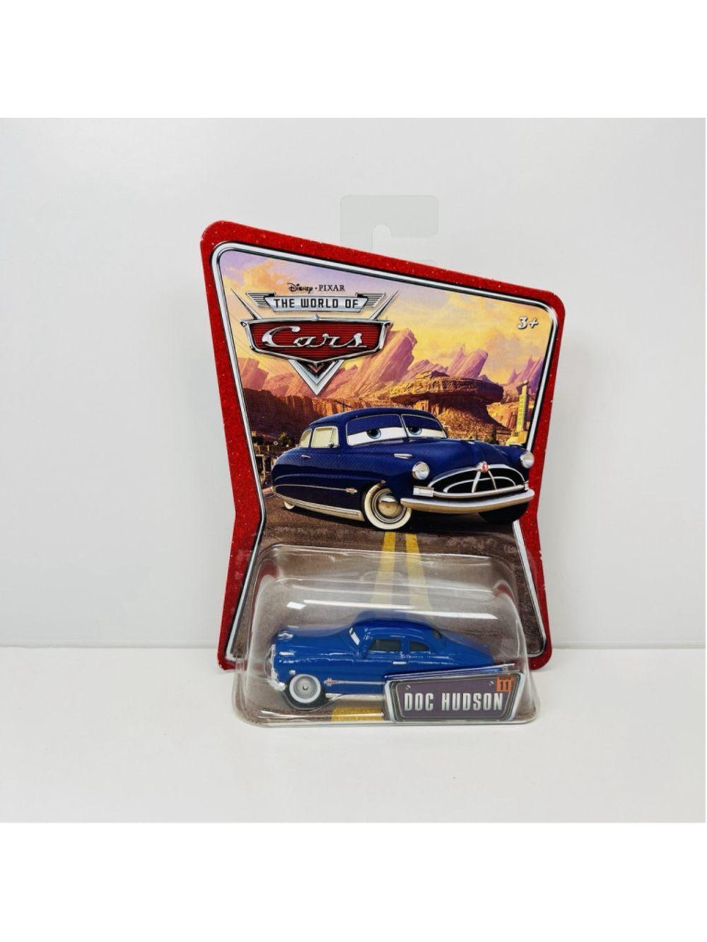 Disney Pixar Cars - DOC HUDSON World Of Cars 2008 - 1:55 Diecast